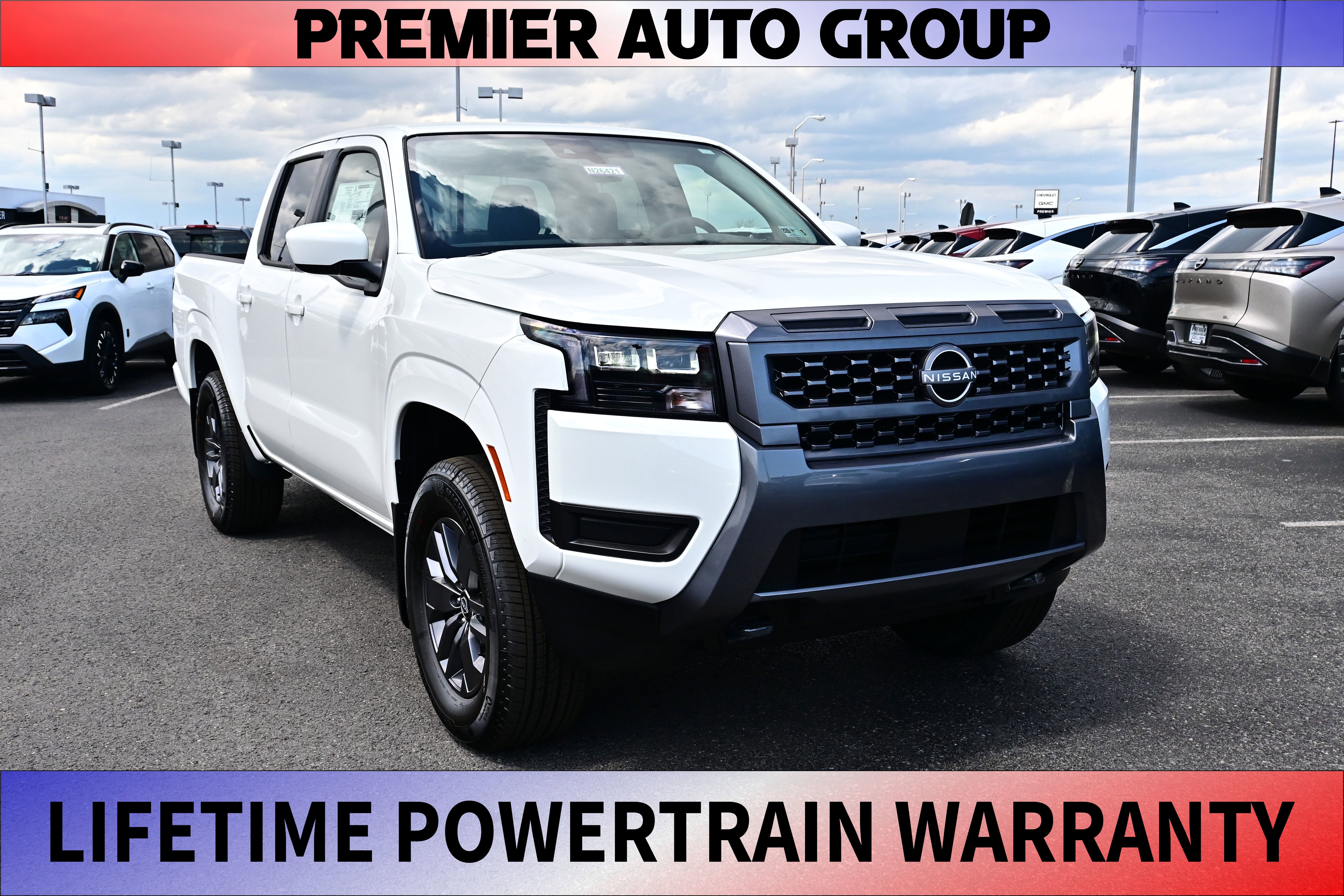 2026 Nissan Frontier Crew Cab SV in Glacier White — front three-quarter view